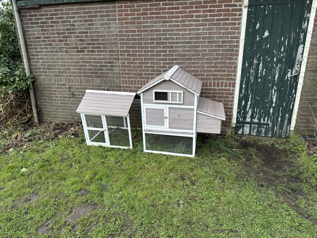 Chicken area with chicken coop inside it